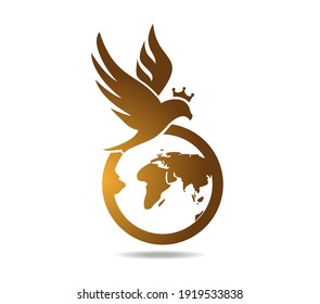 Hawk over the globe. Golden falcon with crone over the planet earth. Logo