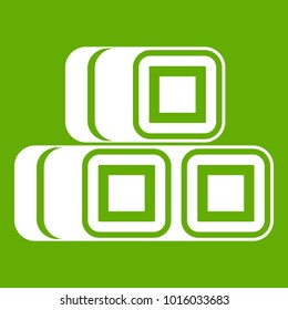 Hay bundles icon white isolated on green background. Vector illustration