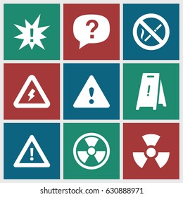 Hazard icons set. set of 9 hazard filled icons such as wet floor, warning, voltage warning, no smoking, radiation