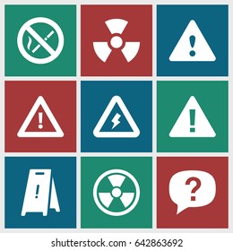 Hazard icons set. set of 9 hazard filled icons such as wet floor, warning, voltage warning, no smoking, radiation