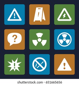 Hazard icons set. set of 9 hazard filled icons such as wet floor, warning, voltage warning, no smoking, radiation