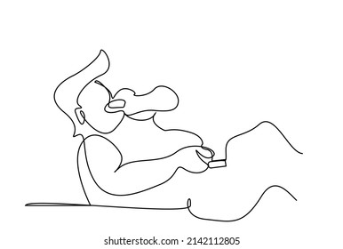 He changes channels while comfortably eating something in front of the TV at home.