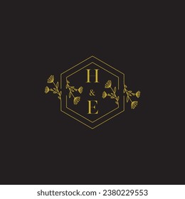 HE elegant wedding initial logo in high quality professional design that will print well across any print media