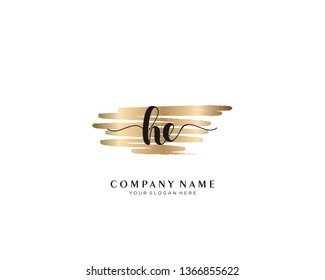 HE initial handwriting logo with brush gold color template vector