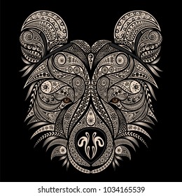 The head of a bear. Vector drawing of an animal from vintage patterns