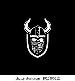 Head of bearded viking warrior with horned helmet.