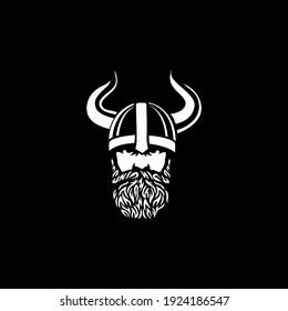 Head of bearded viking warrior with horned helmet