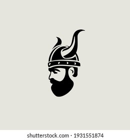 Head of bearded viking warrior with horned helmet