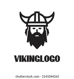 Head of bearded viking warrior with horned helmet