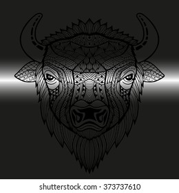 The head of the bull in the style zentangle. Patterned animal's head in the shade with pronounced eyes. Tribal ornament painted by hand. Series ethnic animals. African, Indian design. Vector. Logos.