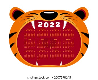 head of a cartoon tiger cub with an open mouth, zits. Wall calendar concept, symbol of New Year 2022 