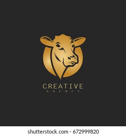 gold cow logo graphic design