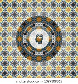 head with gears inside icon inside arabic style badge. Arabesque decoration.