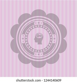 head with gears inside icon inside badge with pink background