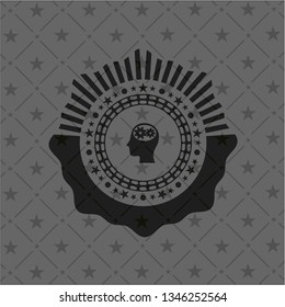 head with gears inside icon inside black emblem