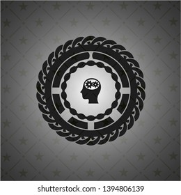 head with gears inside icon inside black emblem
