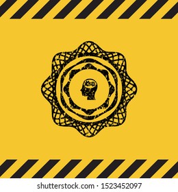 head with gears inside icon black grunge emblem with yellow background. Vector Illustration. Detailed.