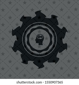 head with gears inside icon inside black badge