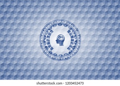 head with gears inside icon inside blue hexagon emblem.