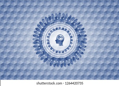head with gears inside icon inside blue emblem with geometric pattern background.