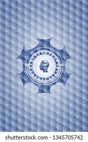 head with gears inside icon inside blue hexagon emblem.