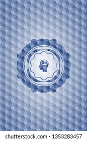 head with gears inside icon inside blue hexagon emblem.
