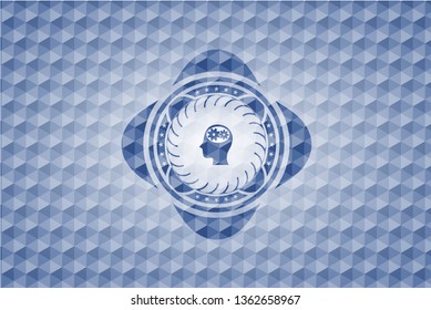 head with gears inside icon inside blue emblem or badge with abstract geometric pattern background.