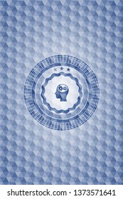 head with gears inside icon inside blue polygonal badge.