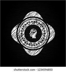 head with gears inside icon inside chalkboard emblem on black board