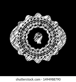 head with gears inside icon inside chalkboard emblem written on a blackboard