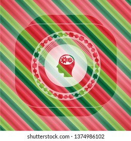 head with gears inside icon inside christmas style badge..