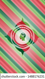head with gears inside icon inside christmas colors style emblem.