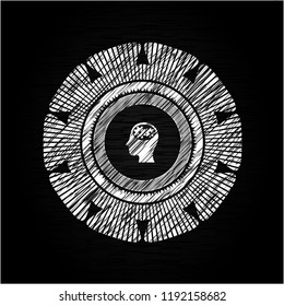 head with gears inside icon drawn on a chalkboard