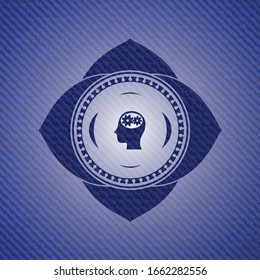 head with gears inside icon inside emblem with denim high quality background