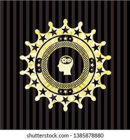 head with gears inside icon inside gold emblem or badge