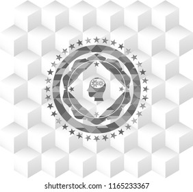 head with gears inside icon inside grey badge with geometric cube white background