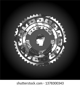 head with gears inside icon inside grey camouflage texture