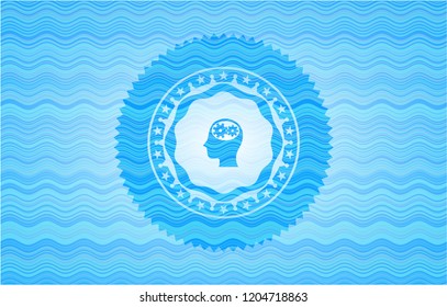 head with gears inside icon inside light blue water badge.