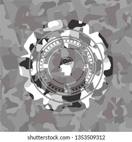 head with gears inside icon on grey camouflaged pattern