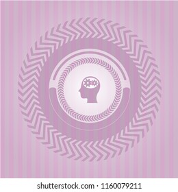 head with gears inside icon inside pink emblem
