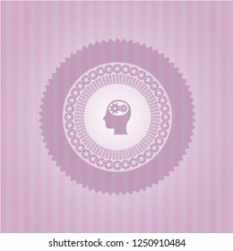 head with gears inside icon inside pink emblem