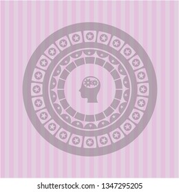 head with gears inside icon inside pink emblem