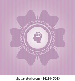 head with gears inside icon inside pink emblem