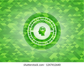 head with gears inside icon inside realistic green mosaic emblem