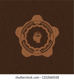 head with gears inside icon inside realistic wood emblem
