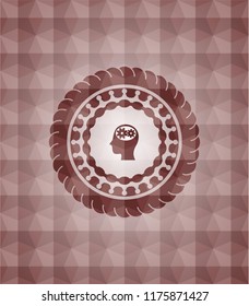 head with gears inside icon inside red seamless polygonal badge.
