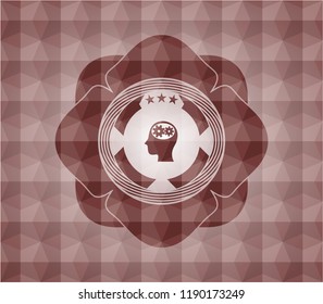 head with gears inside icon inside red seamless emblem or badge with abstract geometric polygonal pattern background.