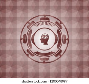head with gears inside icon inside red seamless emblem or badge with abstract geometric polygonal pattern background.