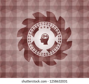 head with gears inside icon inside red seamless emblem with geometric pattern.