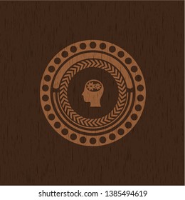head with gears inside icon inside retro style wooden emblem